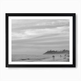 Surfers On The Beach Art Print