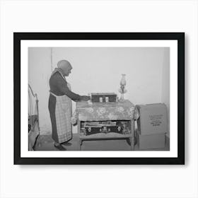Woman Of Spanish Extraction Arranging Things On Table In Her Room, Concho, Arizona By Russell Lee Art Print