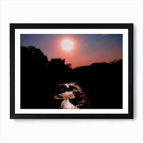 Sunset Over A Stream On The Serengeti, Tanzania (Africa Series) Art Print