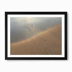 Beige sand and sea water at sunrise Art Print