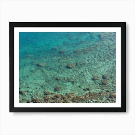 Clear water in a rocky Mediterranean bay Art Print