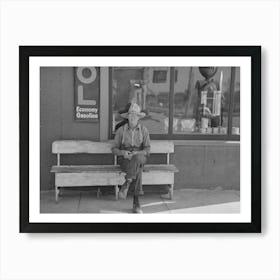 Man Sitting In Front Of Store, Craigville, Minnesota By Russell Lee Art Print