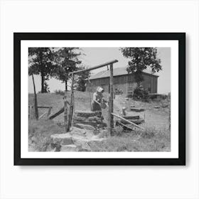 Tenant Farmer Drawing Water At Well, This Woman (Her Husband Died Several Months Ago) And Her Three Grown Son Art Print