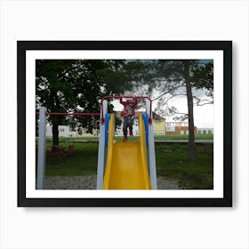 Child On A Playground Slide Art Print