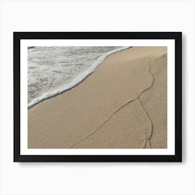 Sand and traces of waves on the beach Art Print