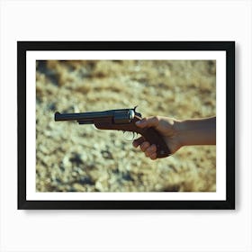 Hand Holding Revolver Art Print