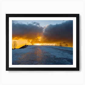 Sunset Over Snow Covered Hill Art Print