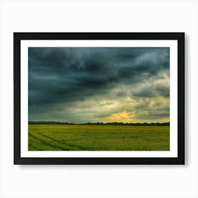 Storm Clouds Over A Field Art Print