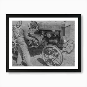 Son Of Pioneer At El Indio, Texas, Repairing Clutch On Tractor By Russell Lee Art Print