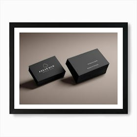 A Minimalist Image Of Two Stacks Of Black Business Cards With Gold Lettering On A Beige Background, Featuring A Soft, Natural Lighting Effect Art Print