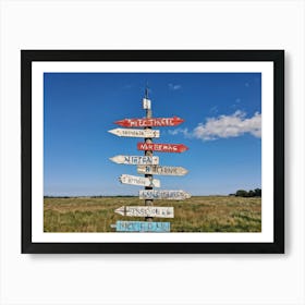 A Weathered Wooden Signpost At A Crossroad Its Arrows Pointing In Various Directions With Hand Pain Art Print