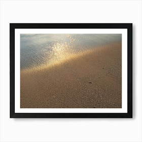 Reflections of sunlight on the sandy beach Art Print