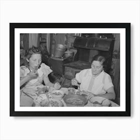 Mrs, Browning And Her Daughter Eating Dinner, This Family Does Much Canning In Line With Fsa (Farm Security Art Print