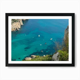 Turquoise sea water, cliffs and boats Art Print