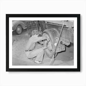 Tightening The Rear Wheel On Truck Which Will Carry Migrant Family To California From Muskogee, Oklahoma By Russell Art Print