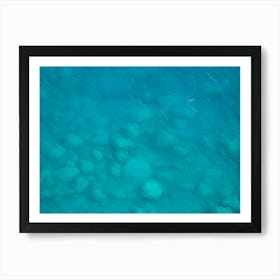 Rocks in the turquoise sea Art Print