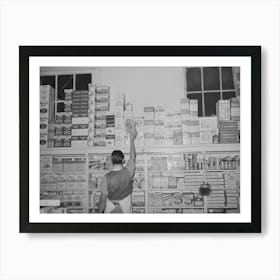 Placing Packaged Goods On Display Rack, Retail Grocery, San Angelo, Texas By Russell Lee Art Print