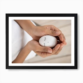 Child Holding An Egg Poster