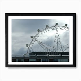 Giant wheel on a cloudy day Art Print