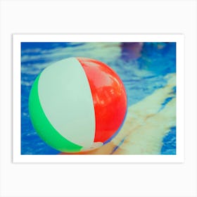 Colorful Beach Ball Floating In Pool Art Print