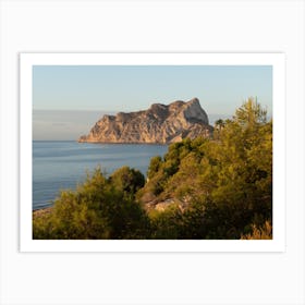 Mediterranean Sea, pine trees and Peñón de Ifach at sunrise Art Print