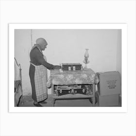 Woman Of Spanish Extraction Arranging Things On Table In Her Room, Concho, Arizona By Russell Lee Art Print