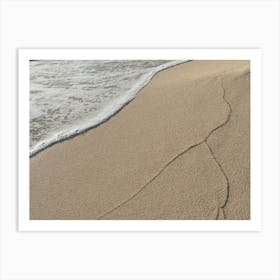 Sand and traces of waves on the beach Art Print