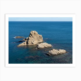 Rock formation in the blue Mediterranean Sea Art Print