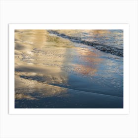 Golden and blue reflections in the sand Art Print