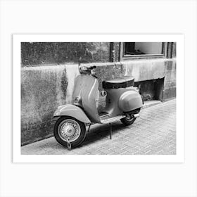 Vintage scooter parking at alley of old mediterranean town Art Print
