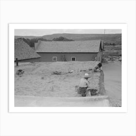 Spanish American Children Replastering Corner Of Roof Of Adobe House, Costilla, New Mexico By Russell Lee Art Print