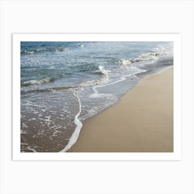 Sea water, waves and sandy beach Art Print