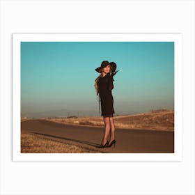 Woman In Black Hat On The Road Art Print