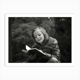 Little Girl Reading A Book Art Print