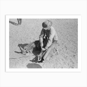 Cowboy Testing Stirrups At Rodeo Before Broncbusting, Quemado, Mew Mexico By Russell Lee Art Print