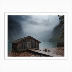 Stormy Lake Boat House Art Print