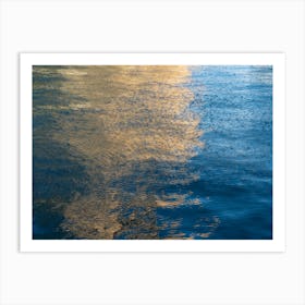 Abstract golden reflections in blue sea water Art Print