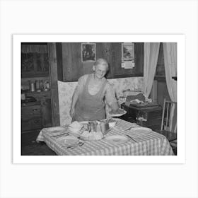 Mrs George Hutton Putting The Food On The Table For Dinner, Pie Town, New Mexico By Russell Lee Art Print