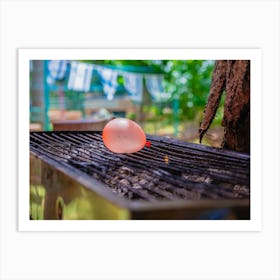 Balloon Filled With Water Placed On A Hot Grill Art Print