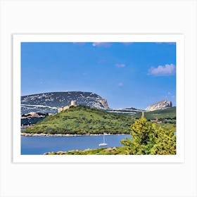 Capo Caccia Sardinia. This image shows a green, mountainous landscape bordering calm blue water, with a sailboat in the foreground. The background includes rugged peaks and scattered historical structures, all beneath a bright, clear sky. Art Print