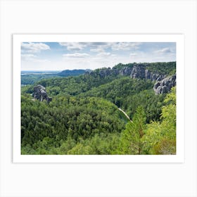 Sandstone rocks and green forest in the Amselgrund, Saxon Switzerland National Park Art Print