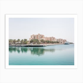 Buildings With Palm Trees And Water Art Print