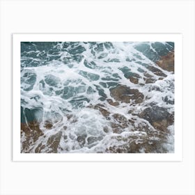Sea water flows over the rocks Art Print
