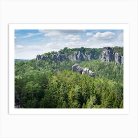 Green forest and sandstone rocks near the Bastei in Saxon Switzerland Art Print