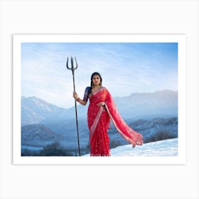 Indian Woman Clad In Traditional Silk Sari Clasps A Trident As She Strides Towards Towering Snowy Art Print