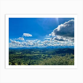 Cumulus Clouds Strewn Across A Blue Sky Above A Sweeping Scenic Landscape Vibrant Greenery Rollin (6) Art Print