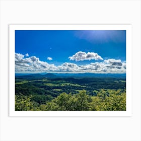 Cumulus Clouds Strewn Across A Blue Sky Above A Sweeping Scenic Landscape Vibrant Greenery Rollin (4) Art Print