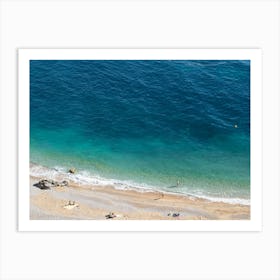 Aerial view of a beach and blue sea water Art Print