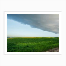 Storm Clouds Over A Green Field Art Print