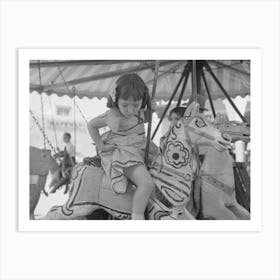 Little Girl On The Merry Go Round Horse, Fiesta, Taos, New Mexico By Russell Lee Art Print